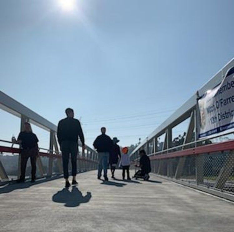 walkers on the bridge christine peters.jpg